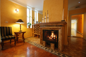 Hotel apartment with fireplace.